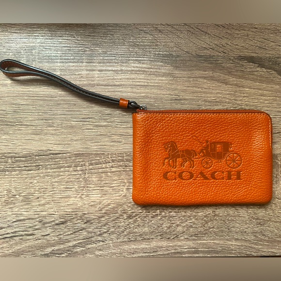 Coach Handbags - Coach Corner Zip Wristlet With Horse And Carriage